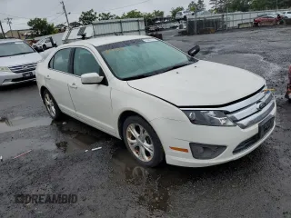 2012 Ford Fusion SE with VIN 3FAHP0HA3CR386483, listed as a Copart auction lot 60967535 with 156,504 mi miles and Salvage title. Bid and sale history available at DreamBid. Image 4.