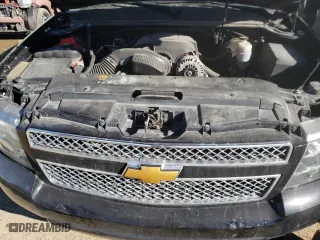 2014 Chevrolet Suburban LT with VIN 1GNSKJE73ER246291, listed as a Copart auction lot 74231304 with 140,688 mi miles and Salvage Title. Bid and sale history available at carsss.com. Image 24.
