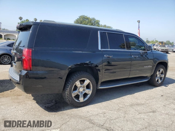 2017 Chevrolet Suburban Premier with VIN 1GNSCJKC8HR226797, listed as a Copart auction lot 62874585 with 150,994 mi miles and Salvage title. Bid and sale history available at DreamBid. Image 3.