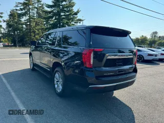 2021 GMC Yukon XL SLT with VIN 1GKS1GKD3MR359119, listed as a Copart auction lot 72097254 with 154,601 mi miles and Clean Title. Bid and sale history available at carsss.com. Image 4.