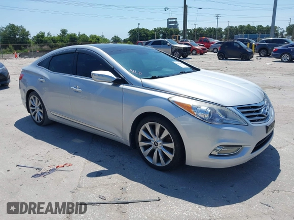 2013 Hyundai Azera with VIN KMHFH4JG6DA321882, listed as a IAAI auction lot 42351891 with 59,690 mi miles and . Bid and sale history available at DreamBid. Image 1.