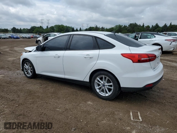 2016 Ford Focus SE с VIN 1FADP3F27GL222556, выставлен на аукционе Copart как лот 59638585 с пробегом 125 648 миль миль и Списание • Salvage title. История ставок и продаж доступна на DreamBid. Изображение 2.