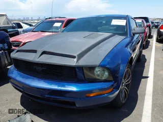 2007 Ford Mustang Deluxe z VIN 1ZVFT80N975241366, wystawiony jako IAAI lot #42408850 z przebiegiem 193 336 mil mil oraz . Historia ofert i sprzedaży dostępna na DreamBid. Obrazek 13.