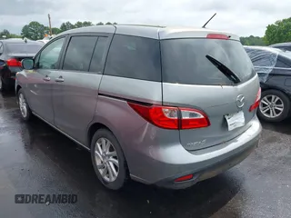 2012 Mazda 5 Sport z VIN JM1CW2BL6C0105662, wystawiony jako IAAI lot #42465711 z przebiegiem 67 534 mil mil oraz . Historia ofert i sprzedaży dostępna na DreamBid. Obrazek 3.