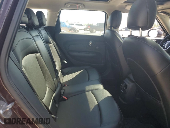 2016 MINI Clubman z VIN WMWLN5C53G2E29697, wystawiony jako Copart lot #52791585 z przebiegiem 115 213 mil mil oraz Tytuł czysty. Historia ofert i sprzedaży dostępna na DreamBid. Obrazek 11.