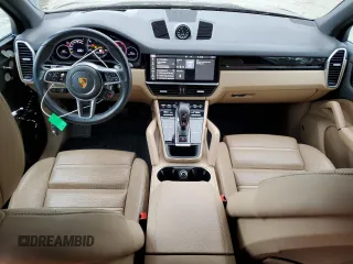 2021 Porsche Cayenne E-Hybrid with VIN WP1AE2AYXMDA25040, listed as a Copart auction lot 47036355 with 63,165 mi miles and Salvage title. Bid and sale history available at DreamBid. Image 8.