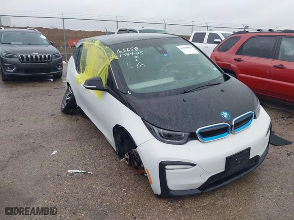 2019 BMW i3 with VIN WBY8P2C59K7D97415, listed as a IAAI auction lot 41509553 with 58,083 mi miles. Bid and sale history available at carsss.com. Image 1.