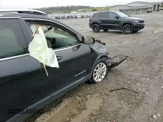2019 Jeep Cherokee Latitude z VIN 1C4PJMCB7KD437649, wystawiony jako Copart lot #51525735 z przebiegiem Nie podano mil oraz Szkoda całkowita • Salvage title. Historia ofert i sprzedaży dostępna na DreamBid. Obrazek 11.
