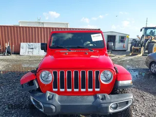 2020 Jeep Wrangler Unlimited Sahara High Altitude with VIN 1C4HJXEG2LW182641, listed as a IAAI auction lot 40130890 with 79,984 mi miles and . Bid and sale history available at DreamBid. Image 12.