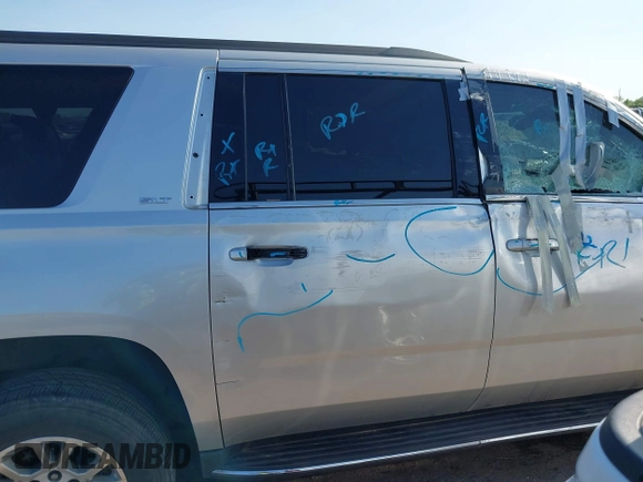 2016 GMC Yukon XL SLT z VIN 1GKS1GKC3GR268945, wystawiony jako IAAI lot #41864816 z przebiegiem 171 815 mil mil oraz . Historia ofert i sprzedaży dostępna na DreamBid. Obrazek 13.