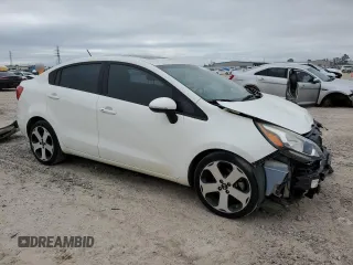 2015 Kia Rio EX with VIN KNADN4A32F6424365, listed as a Copart auction lot 70862234 with 87,586 mi miles and Salvage Title. Bid and sale history available at carsss.com. Image 4.