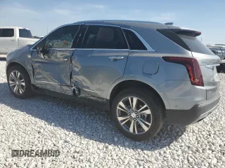2024 Cadillac XT5 AWD Premium Luxury with VIN 1GYKNDRS6RZ733825, listed as a Copart auction lot 50414195 with 14,816 mi miles and Salvage title. Bid and sale history available at DreamBid. Image 2.
