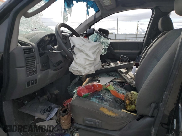2007 Nissan Titan XE z VIN 1N6AA06B17N205377, wystawiony jako Copart lot #50738625 z przebiegiem 191 068 mil mil oraz Szkoda całkowita • Salvage title. Historia ofert i sprzedaży dostępna na DreamBid. Obrazek 7.