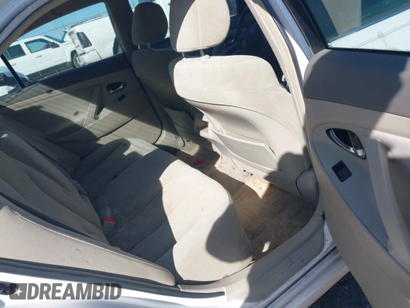 2009 Toyota Camry z VIN 4T1BE46K79U823620, wystawiony jako IAAI lot #41633601 z przebiegiem 203 940 mil mil oraz . Historia ofert i sprzedaży dostępna na DreamBid. Obrazek 8.