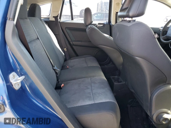 2009 Dodge Caliber SXT with VIN 1B3HB48A09D116274, listed as a Copart auction lot 49222585 with 144,852 mi miles and Salvage Title. Bid and sale history available at DreamBid. Image 11.