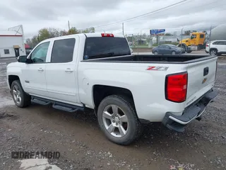 2016 Chevrolet Silverado 1500 LT with VIN 3GCUKREC0GG136136, listed as a IAAI auction lot 41971199 with 179,045 mi miles and . Bid and sale history available at DreamBid. Image 3.