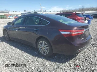 2013 Toyota Avalon XLE with VIN 4T1BK1EB0DU024134, listed as a Copart auction lot 48115155 with 169,227 mi miles and Salvage Title. Bid and sale history available at DreamBid. Image 2.
