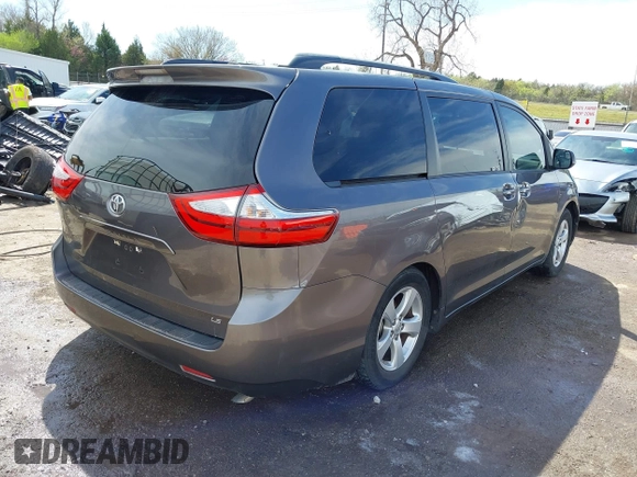 2015 Toyota Sienna LE AAS with VIN 5TDKK3DC5FS575077, listed as a IAAI auction lot 41941483 with 134,265 mi miles. Bid and sale history available at carsss.com. Image 4.