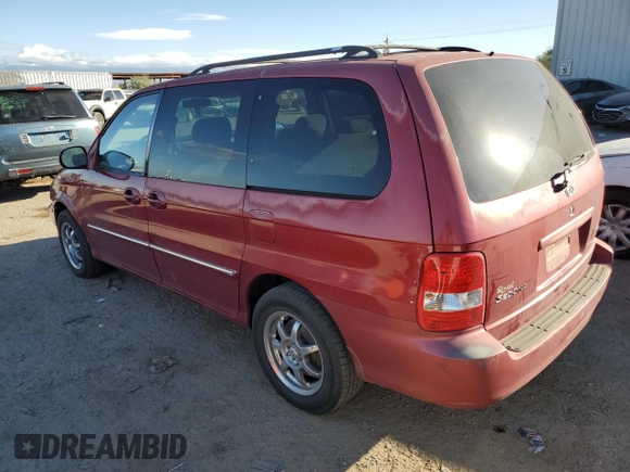 2005 Kia Sedona LX with VIN KNDUP132156669009, listed as a Copart auction lot 76936094 with 124,989 mi miles and Salvage Title. Bid and sale history available at carsss.com. Image 2.