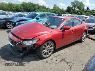 2014 Mazda 6 i Grand Touring с VIN JM1GJ1W55E1100617, выставлен на аукционе Copart как лот 46215305 с пробегом 139 821 миль миль и Списание • Salvage title. История ставок и продаж доступна на DreamBid. Изображение 1.