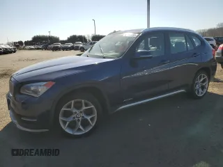 2015 BMW X1 xDrive28i with VIN WBAVL1C59FVY31984, listed as a Copart auction lot 49105155 with 135,940 mi miles and Clean Title. Bid and sale history available at carsss.com. Image 1.