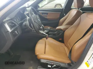 2016 BMW 3 Series 328i with VIN WBA8E9G51GNT84259, listed as a Copart auction lot 52501875 with 69,729 mi miles and Salvage title. Bid and sale history available at DreamBid. Image 7.