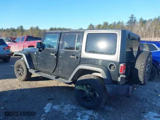2015 Jeep Wrangler Unlimited Sport with VIN 1C4BJWDG5FL766989, listed as a IAAI auction lot 41342159 with 182,483 mi miles. Bid and sale history available at carsss.com. Image 14.