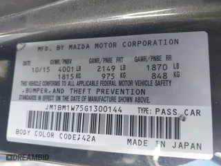 2016 Mazda Mazda3 i Touring with VIN JM1BM1W75G1300144, listed as a IAAI auction lot 41883503 with 112,927 mi miles. Bid and sale history available at carsss.com. Image 9.