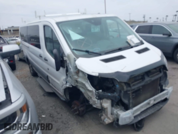 2017 Ford Transit XL z VIN 1FBZX2YM1HKA98823, wystawiony jako IAAI lot #42066291 z przebiegiem 100 011 mil mil oraz . Historia ofert i sprzedaży dostępna na DreamBid. Obrazek 1.