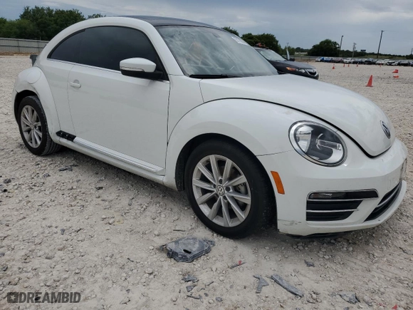 2019 Volkswagen Beetle SE with VIN 3VWJD7AT4KM710591, listed as a Copart auction lot 63178804 with 56,722 mi miles and Salvage Title. Bid and sale history available at carsss.com. Image 4.