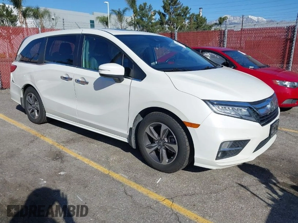 2018 Honda Odyssey Touring with VIN 5FNRL6H8XJB019122, listed as a IAAI auction lot 41820212 with 144,014 mi miles. Bid and sale history available at carsss.com. Image 1.