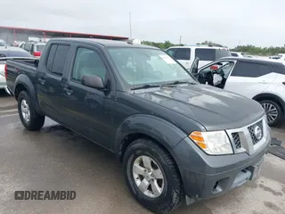 2012 Nissan Frontier SV z VIN 1N6AD0ER4CC402085, wystawiony jako IAAI lot #41975832 z przebiegiem 263 152 mil mil oraz . Historia ofert i sprzedaży dostępna na DreamBid. Obrazek 1.