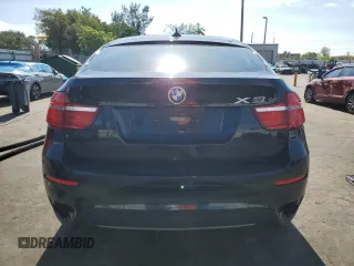 2013 BMW X6 xDrive35i z VIN 5UXFG2C50DL785065, wystawiony jako Copart lot #57036985 z przebiegiem 135 515 mil mil oraz Tytuł czysty. Historia ofert i sprzedaży dostępna na DreamBid. Obrazek 6.