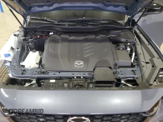 2025 Mazda CX-70 с VIN JM3KJEHC9S1112334, выставлен на аукционе Copart как лот 52044705 с пробегом 3 418 миль миль и Списание • Salvage title. История ставок и продаж доступна на DreamBid. Изображение 12.