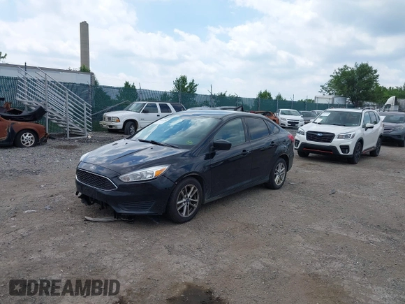 2018 Ford Focus SE с VIN 1FADP3FE5JL318316, выставлен на аукционе IAAI как лот 42612295 с пробегом 95 288 миль миль и . История ставок и продаж доступна на DreamBid. Изображение 18.