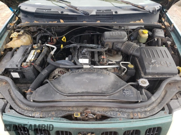 1999 Jeep Grand Cherokee Limited with VIN 1J4GW68S1XC744666, listed as a Copart auction lot 88337895 with 243,480 mi miles and Salvage Title. Bid and sale history available at carsss.com. Image 12.