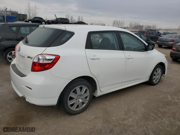 2013 Toyota Matrix L with VIN 2T1KU4EE2DC090983, listed as a Copart auction lot 87225934 with 310,340 mi miles and Clean Title. Bid and sale history available at carsss.com. Image 3.