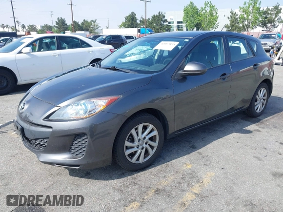 2012 Mazda Mazda3 i Touring with VIN JM1BL1L89C1676291, listed as a IAAI auction lot 42087895 with 61,805 mi miles. Bid and sale history available at carsss.com. Image 2.