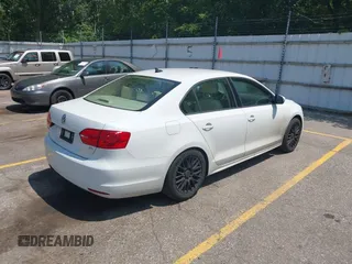 2014 Volkswagen Jetta SE with VIN 3VWD07AJ8EM296243, listed as a IAAI auction lot 42754554 with 149,717 mi miles and . Bid and sale history available at DreamBid. Image 4.
