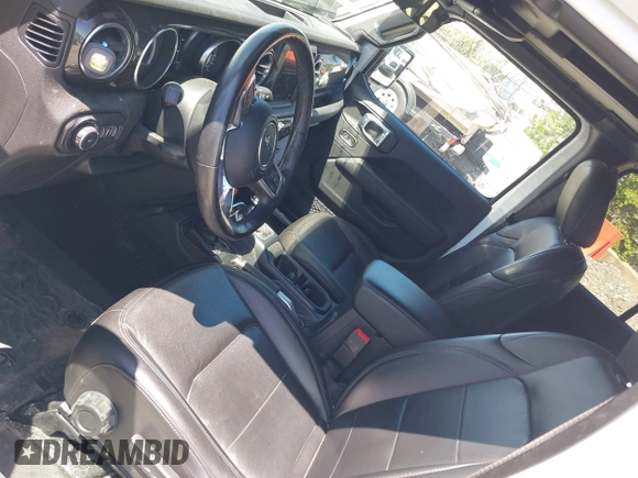 2021 Jeep Wrangler Unlimited Sahara z VIN 1C4HJXEN2MW528137, wystawiony jako IAAI lot #42134514 z przebiegiem 50 030 mil mil oraz . Historia ofert i sprzedaży dostępna na DreamBid. Obrazek 19.