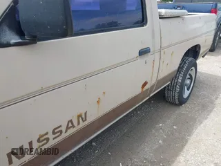 1986 Nissan Hardbody E with VIN JN6ND11S0GW000696, listed as a IAAI auction lot 42358321 with 445,199 mi miles and . Bid and sale history available at DreamBid. Image 6.