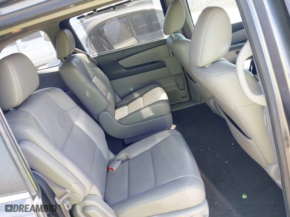2012 Honda Odyssey EX-L with VIN 5FNRL5H64CB131197, listed as a IAAI auction lot 41829107 with 215,115 mi miles. Bid and sale history available at carsss.com. Image 8.