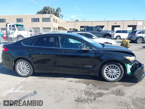 2015 Ford Fusion SE Hybrid with VIN 3FA6P0LU9FR294551, listed as a IAAI auction lot 41545007 with 179,906 mi miles. Bid and sale history available at carsss.com. Image 14.