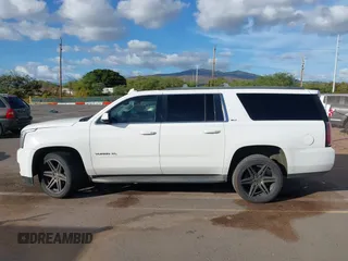 2015 GMC Yukon XL SLT with VIN 1GKS1HKC2FR612690, listed as a IAAI auction lot 41234188 with 113,830 mi miles. Bid and sale history available at carsss.com. Image 14.