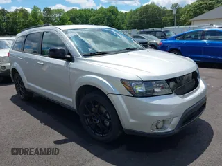 2014 Dodge Journey SXT with VIN 3C4PDCBB0ET281861, listed as a IAAI auction lot 42187485 with 124,191 mi miles and . Bid and sale history available at DreamBid. Image 1.