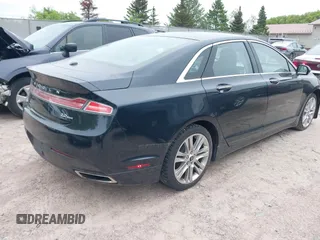 2014 Lincoln MKZ with VIN 3LN6L2G97ER804381, listed as a IAAI auction lot 42277543 with 120,907 mi miles and . Bid and sale history available at DreamBid. Image 4.