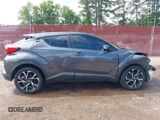 2018 Toyota C-HR XLE z VIN NMTKHMBX5JR045242, wystawiony jako IAAI lot #42209395 z przebiegiem 78 755 mil mil oraz . Historia ofert i sprzedaży dostępna na DreamBid. Obrazek 14.