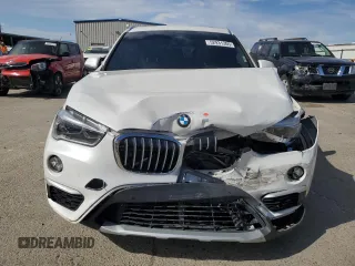 2016 BMW X1 xDrive28i z VIN WBXHT3C31GP880552, wystawiony jako Copart lot #52931305 z przebiegiem 127 225 mil mil oraz Szkoda całkowita • Salvage title. Historia ofert i sprzedaży dostępna na DreamBid. Obrazek 5.