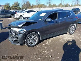 2022 BMW X2 xDrive28i with VIN WBXYJ1C05N5U40472, listed as a IAAI auction lot 41433452 with 67,801 mi miles. Bid and sale history available at carsss.com. Image 16.