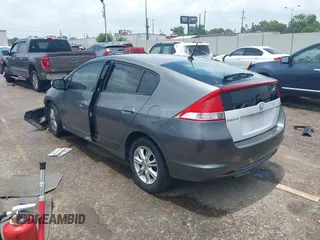 2010 Honda Insight EX z VIN JHMZE2H72AS023404, wystawiony jako IAAI lot #42505042 z przebiegiem Nie podano mil oraz . Historia ofert i sprzedaży dostępna na DreamBid. Obrazek 3.